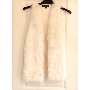 White faux fur vest